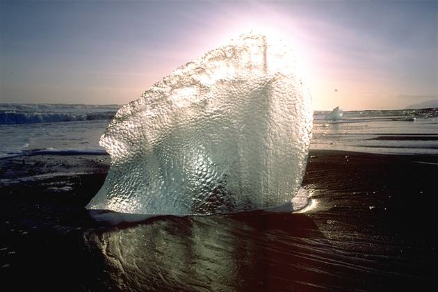 Block of ice in sand